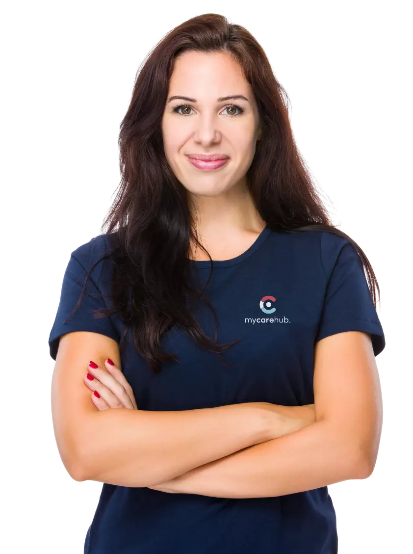 Professional, mycarehub employee smiling at camera with arms crossed